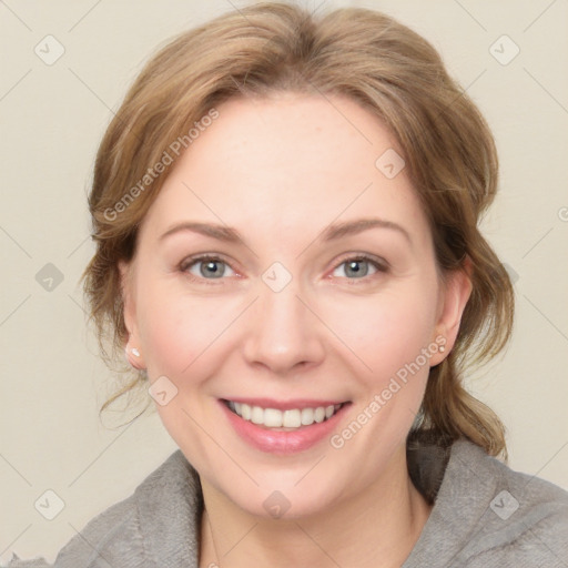 Joyful white young-adult female with medium  brown hair and blue eyes