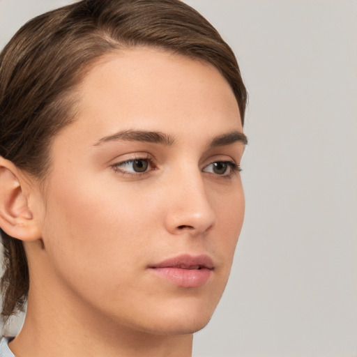 Neutral white young-adult female with medium  brown hair and brown eyes