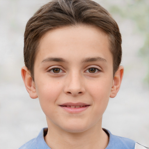 Joyful white child male with short  brown hair and brown eyes