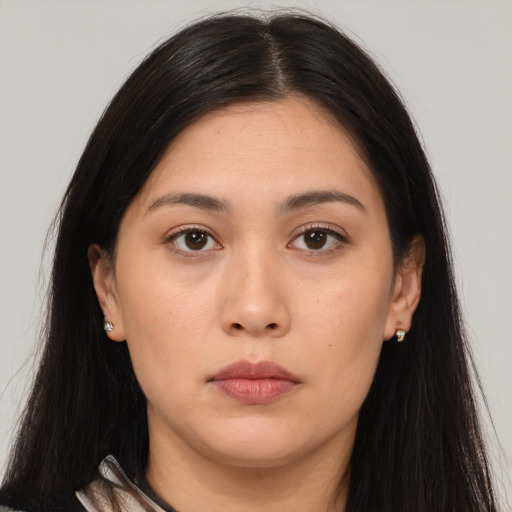 Neutral asian young-adult female with long  brown hair and brown eyes
