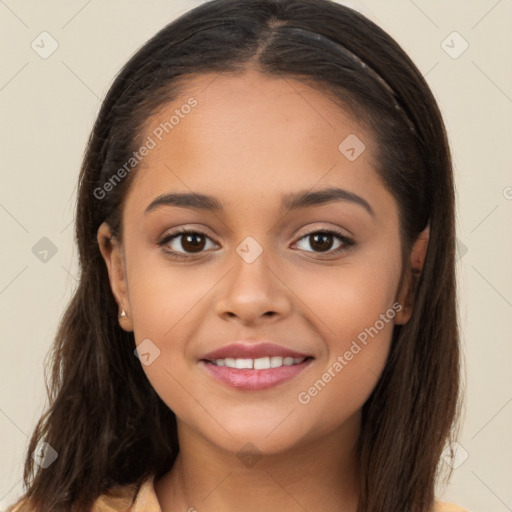 Joyful latino young-adult female with long  brown hair and brown eyes