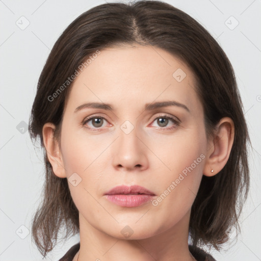 Neutral white young-adult female with medium  brown hair and grey eyes