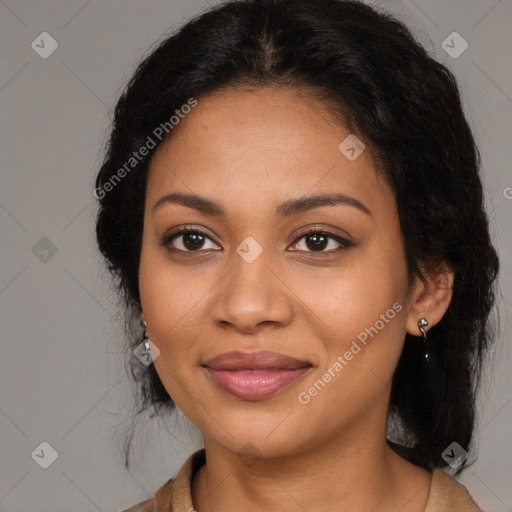 Joyful latino young-adult female with long  brown hair and brown eyes