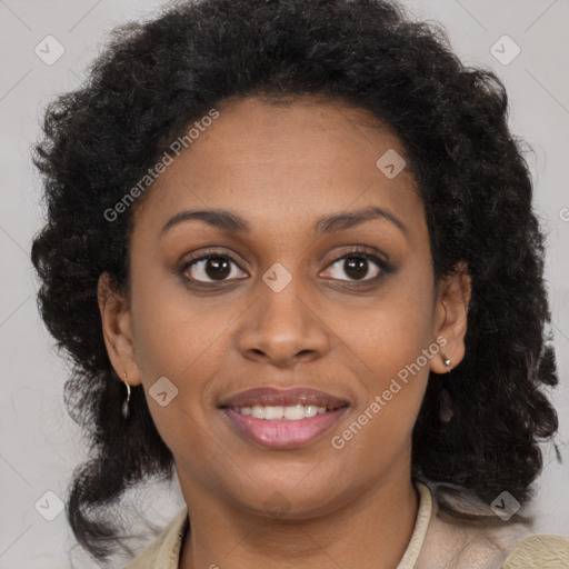 Joyful black young-adult female with medium  brown hair and brown eyes