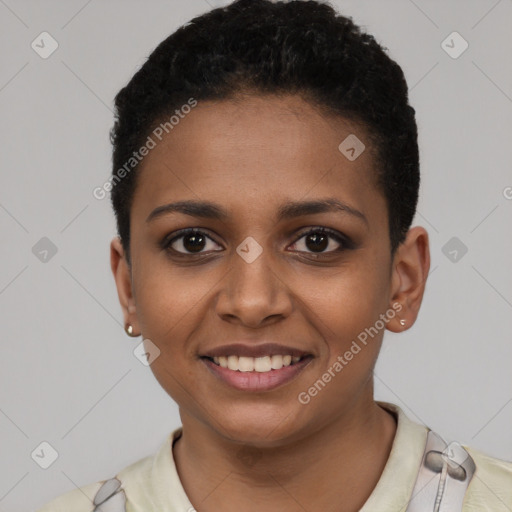 Joyful black young-adult female with short  black hair and brown eyes