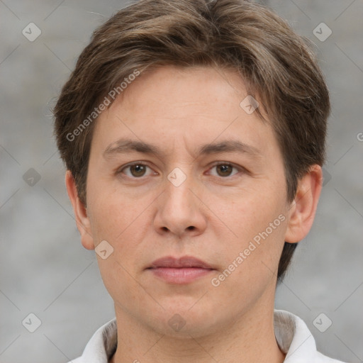 Joyful white adult female with short  brown hair and brown eyes