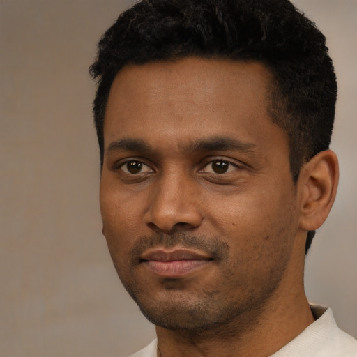 Neutral black young-adult male with short  black hair and brown eyes