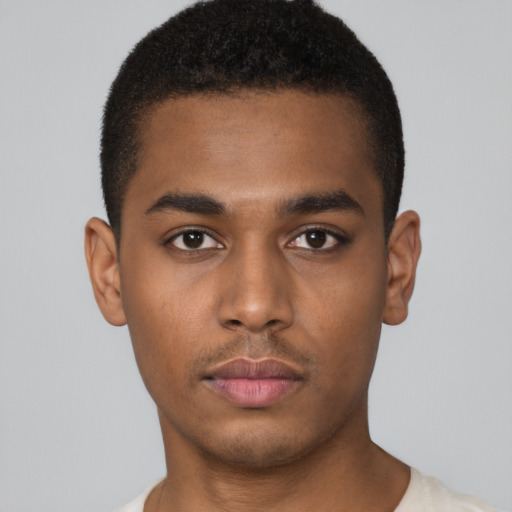 Neutral black young-adult male with short  black hair and brown eyes