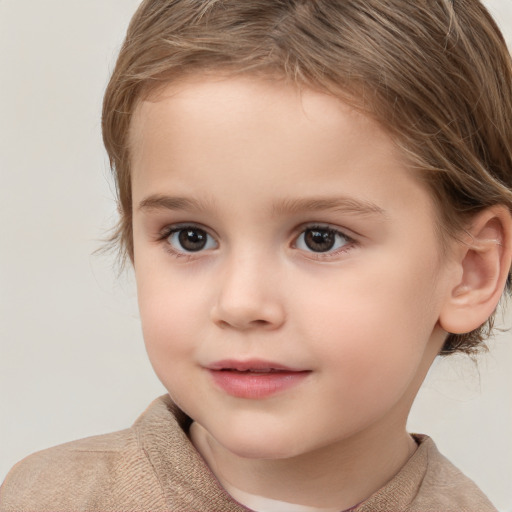 Joyful white child female with short  brown hair and brown eyes