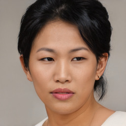 Neutral asian young-adult female with short  black hair and brown eyes