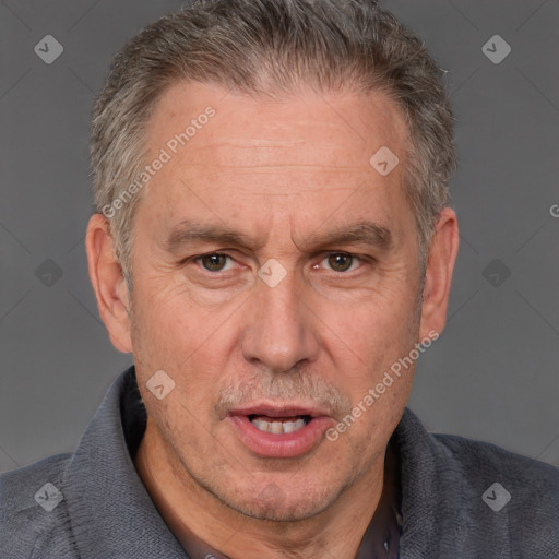 Joyful white middle-aged male with short  brown hair and brown eyes