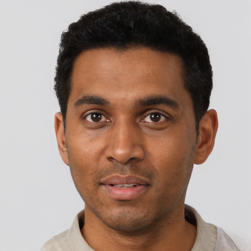 Neutral black young-adult male with short  black hair and brown eyes