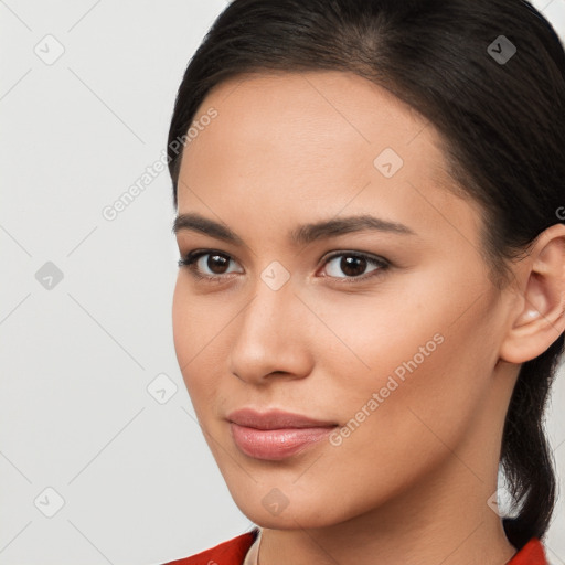 Neutral white young-adult female with long  brown hair and brown eyes