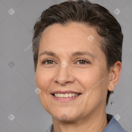 Joyful white adult female with short  brown hair and brown eyes