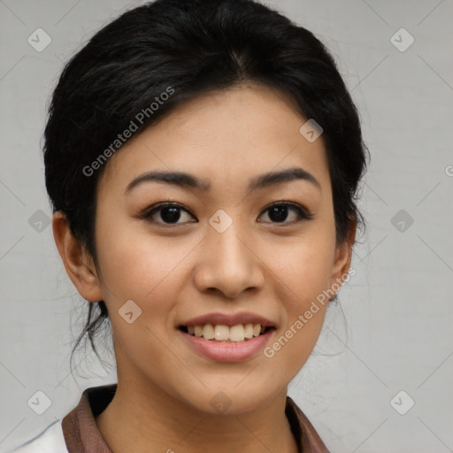 Joyful asian young-adult female with medium  black hair and brown eyes