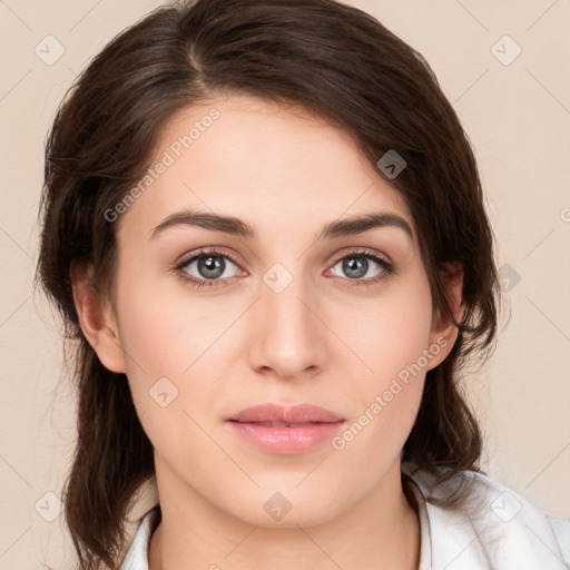 Joyful white young-adult female with medium  brown hair and green eyes