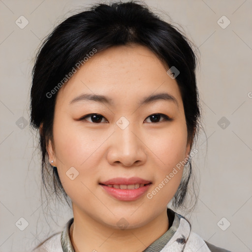 Joyful asian young-adult female with medium  black hair and brown eyes