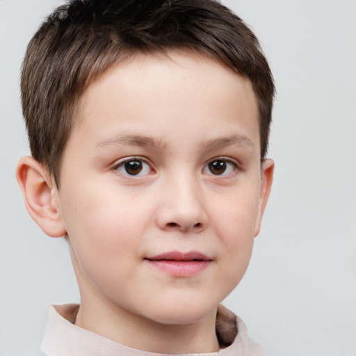 Joyful white child male with short  brown hair and brown eyes