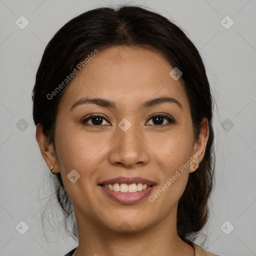 Joyful latino young-adult female with medium  brown hair and brown eyes