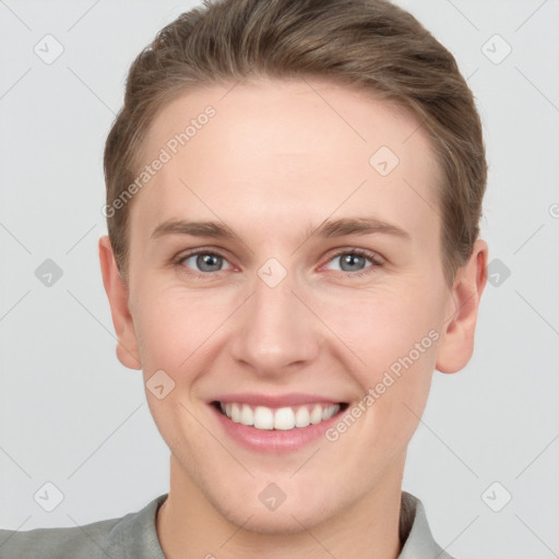 Joyful white young-adult female with short  brown hair and grey eyes