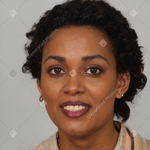 Joyful black young-adult female with medium  brown hair and brown eyes