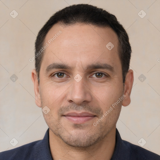 Joyful white adult male with short  brown hair and brown eyes