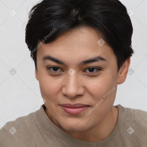 Joyful asian young-adult female with short  brown hair and brown eyes