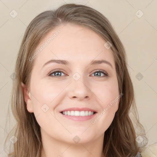 Joyful white young-adult female with long  brown hair and grey eyes