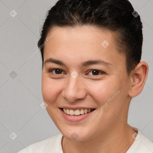 Joyful white young-adult female with short  brown hair and brown eyes