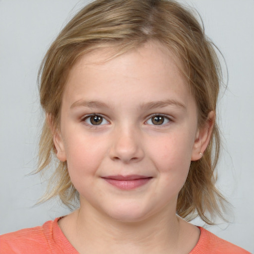 Joyful white child female with medium  brown hair and brown eyes