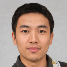 Neutral asian young-adult male with short  black hair and brown eyes