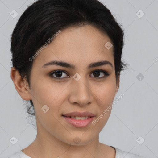 Joyful asian young-adult female with short  brown hair and brown eyes