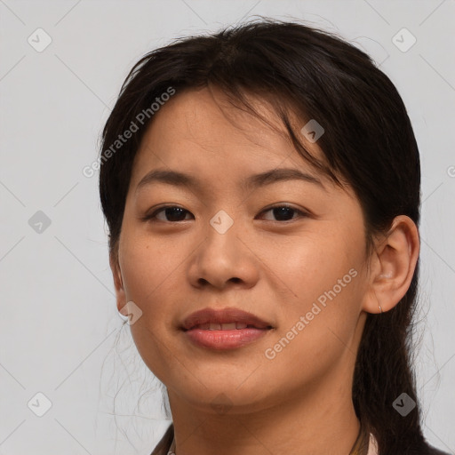 Joyful asian young-adult female with medium  brown hair and brown eyes