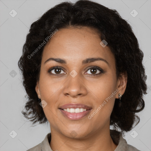 Joyful black young-adult female with medium  brown hair and brown eyes