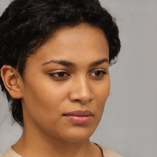 Neutral latino young-adult female with short  brown hair and brown eyes