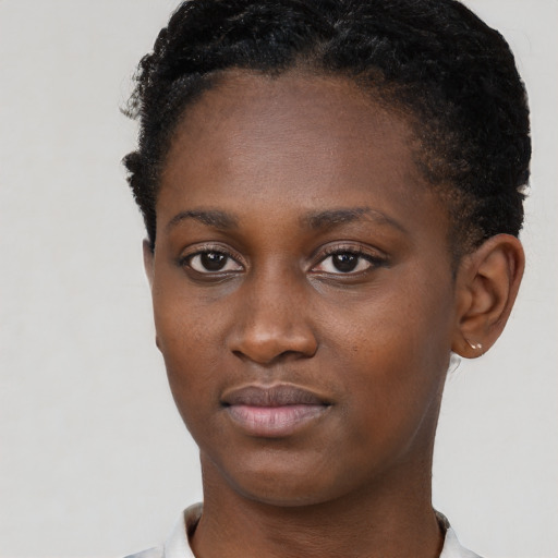 Neutral black young-adult female with short  black hair and brown eyes