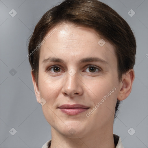 Joyful white young-adult female with short  brown hair and brown eyes