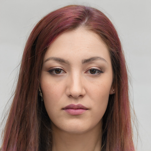 Neutral white young-adult female with long  brown hair and grey eyes