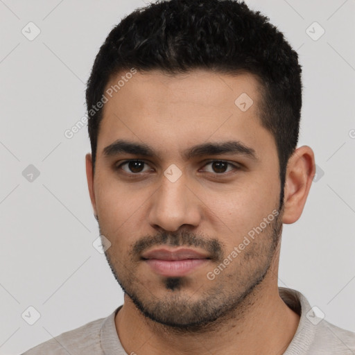 Neutral latino young-adult male with short  black hair and brown eyes