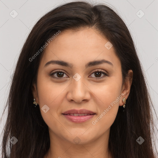 Joyful latino young-adult female with long  brown hair and brown eyes