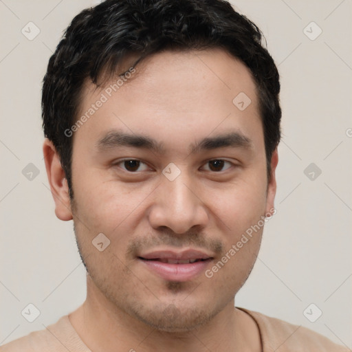 Joyful white young-adult male with short  black hair and brown eyes