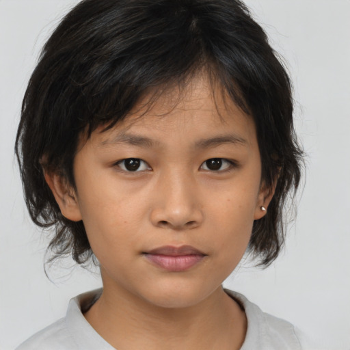 Neutral asian child female with medium  brown hair and brown eyes