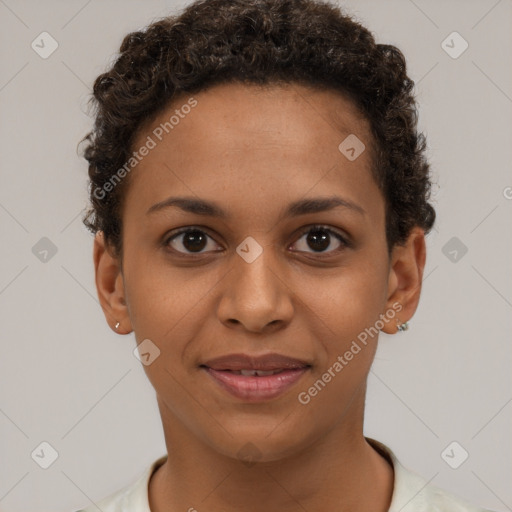 Joyful black young-adult female with short  brown hair and brown eyes