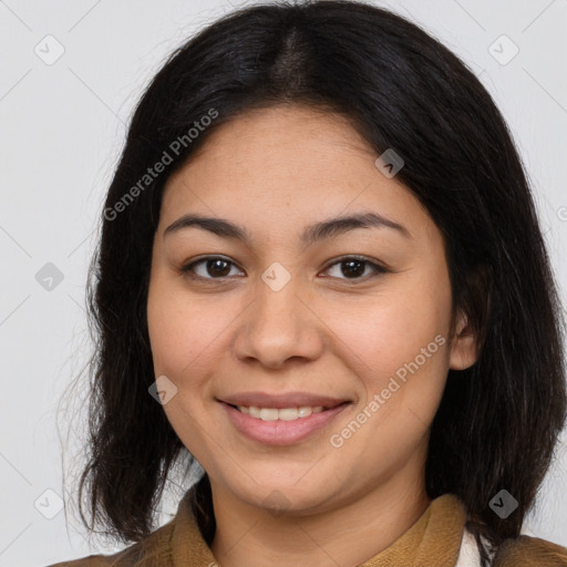 Joyful latino young-adult female with medium  brown hair and brown eyes