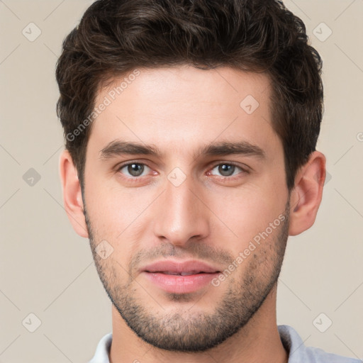 Neutral white young-adult male with short  brown hair and brown eyes