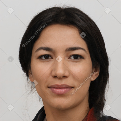 Joyful asian young-adult female with medium  black hair and brown eyes