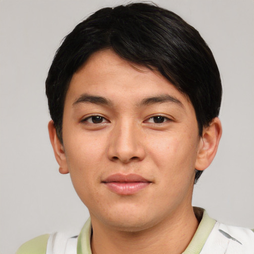 Joyful asian young-adult male with short  black hair and brown eyes