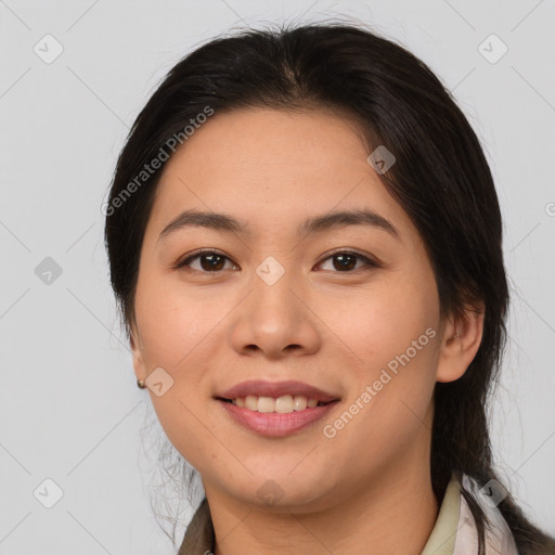 Joyful asian young-adult female with medium  brown hair and brown eyes