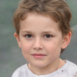 Joyful white child male with short  brown hair and brown eyes