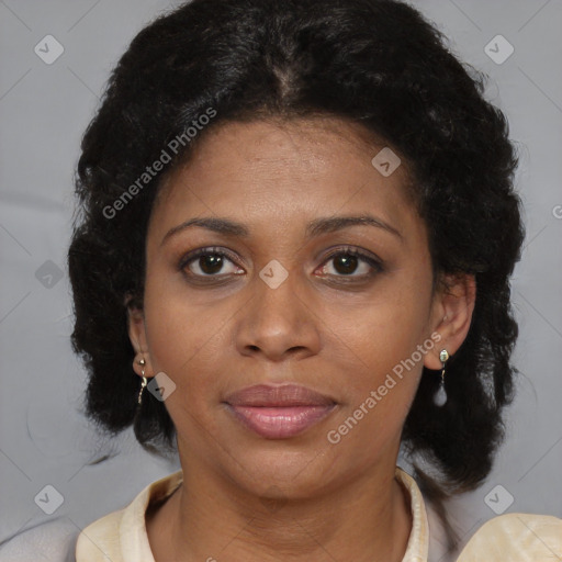 Joyful black adult female with short  brown hair and brown eyes